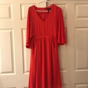 Elegant red dress with pockets